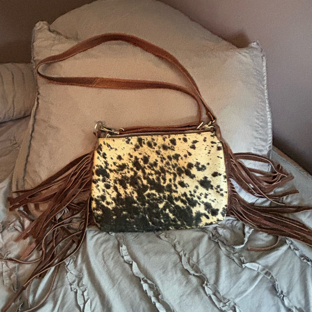 Cow hair crossbody with fringe. NWOT